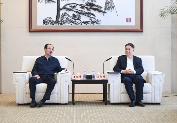 丁焰章與中國華能董事長、黨組書記溫樞剛會談